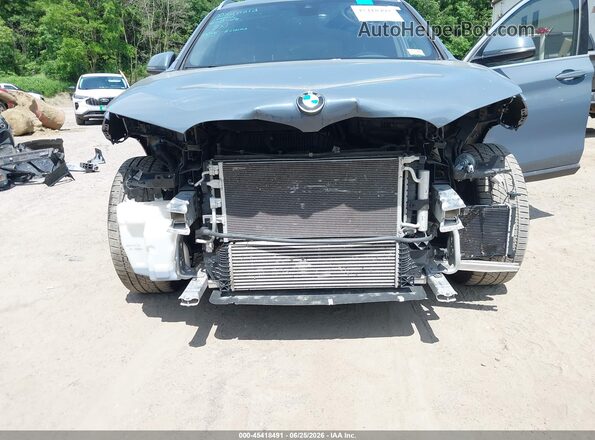 WBXJG9C07M5S06363 2021 BMW X1 Blue Դիմացի տեսք