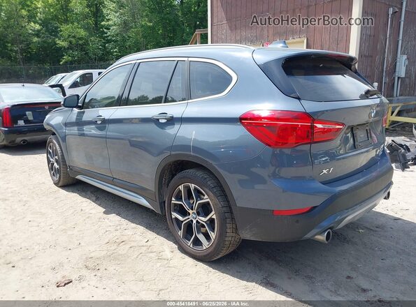 WBXJG9C07M5S06363 2021 BMW X1 Blue Հետևի ձախ