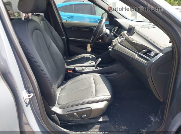 WBXJG9C07M5S06363 2021 BMW X1 Blue Սալոնի դիմացի տեսք