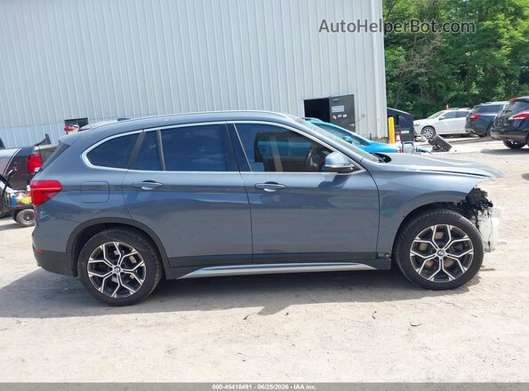 WBXJG9C07M5S06363 2021 BMW X1 Blue Սալոնի հետևի տեսք