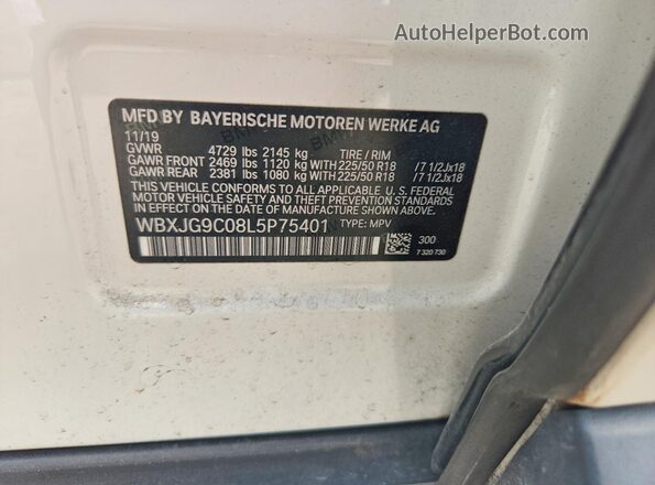 WBXJG9C08L5P75401 2020 BMW X1 White VIN sticker view