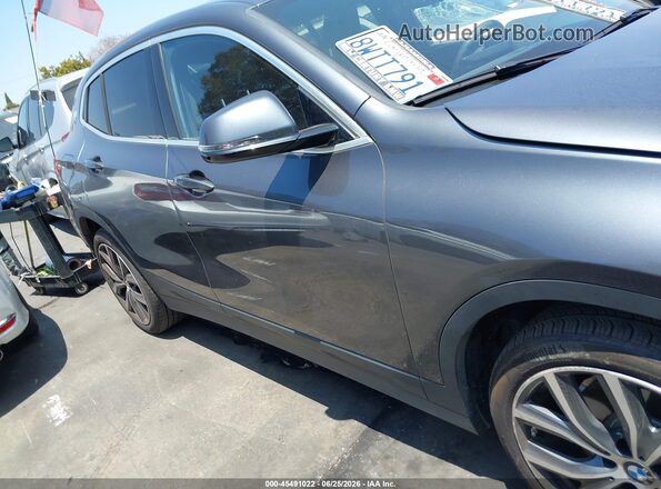 WBXYH9C03M5S76440 2021 BMW X2 Gray Rear interior view