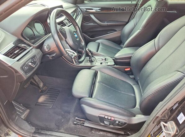 WBXYH9C05L5P15636 2020 BMW X2 Black წინა სალონის ხედი
