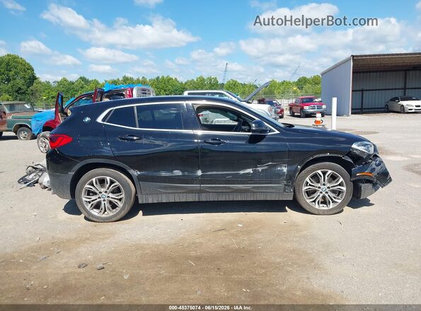 WBXYJ1C00L5P36285 2020 BMW X2 Black Вид задньої частини салону
