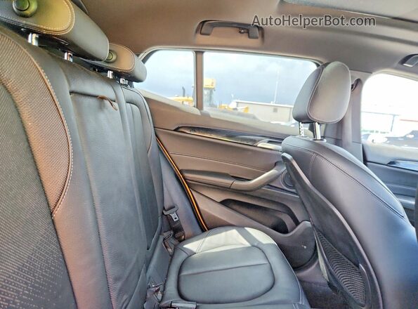 WBXYJ3C37JEB37857 2018 BMW X2 Gold Rear seats view