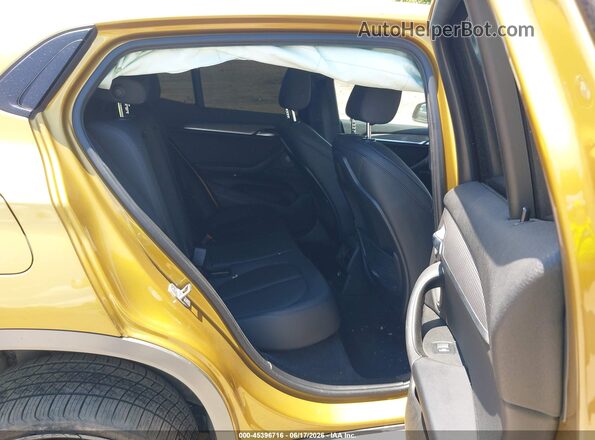 WBXYJ5C32JEF71986 2018 BMW X2 Gold Vista de la etiqueta del VIN