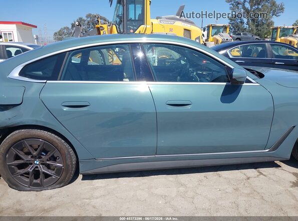 WBY23HD04SFV07491 2025 BMW I4 Green Вид задньої частини салону