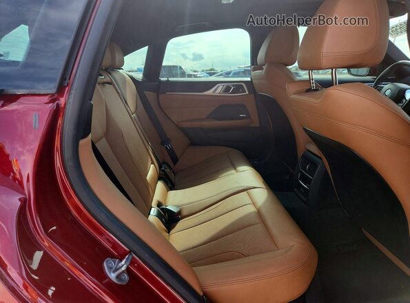 WBY23HD0XSFT99569 2025 BMW I4 Red Vista de los asientos traseros