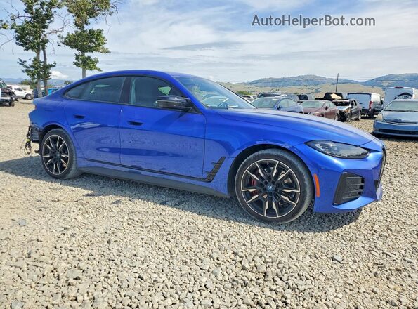 WBY33AW00RFT26519 2024 BMW I4 Blue Front right