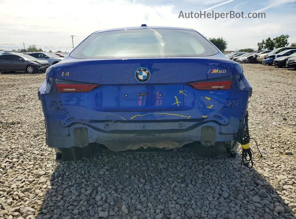 WBY33AW00RFT26519 2024 BMW I4 Blue Rear view