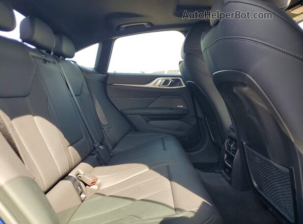 WBY33AW00RFT26519 2024 BMW I4 Blue Rear seats view