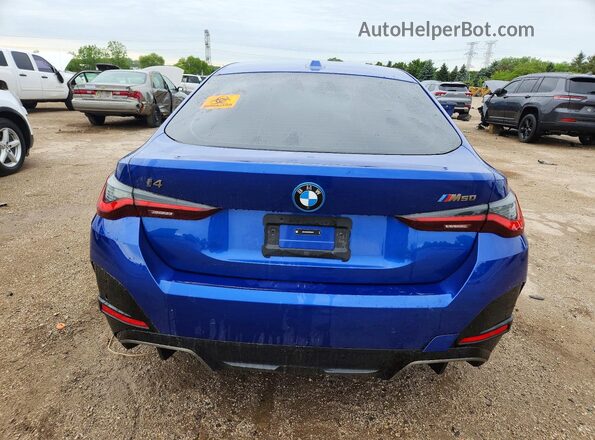 WBY33AW09RFR75073 2024 BMW I4 Blue Հետևի տեսք