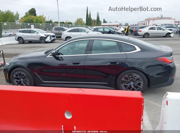 WBY43AW01RFT37730 2024 BMW I4 Black Սալոնի 360 աստիճան տեսք