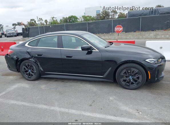 WBY43AW01RFT37730 2024 BMW I4 Black Սալոնի հետևի տեսք