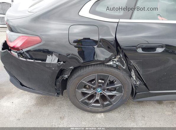 WBY43AW01RFT37730 2024 BMW I4 Black Դիմացի տեսք