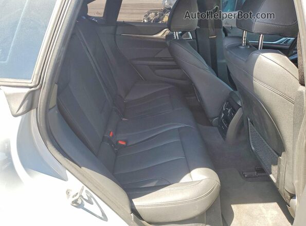 WBY43AW04RFS79810 2024 BMW I4 Gray Vista de los asientos traseros