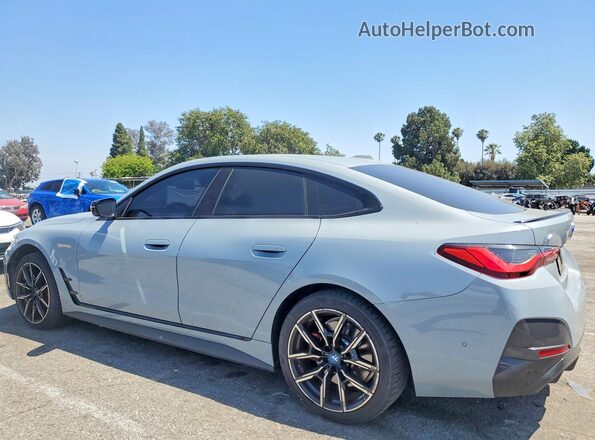 WBY43AW04RFS79810 2024 BMW I4 Gray Trasero izquierdo