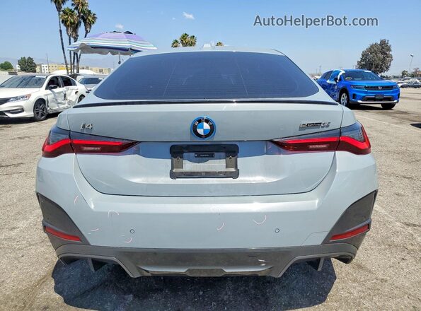 WBY43AW04RFS79810 2024 BMW I4 Gray Vista trasera