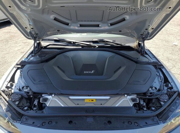 WBY43AW04RFS79810 2024 BMW I4 Gray Vista interior trasera