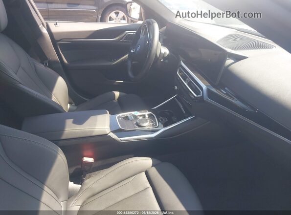 WBY43AW07RFT06689 2024 BMW I4 Black Vista interior delantera