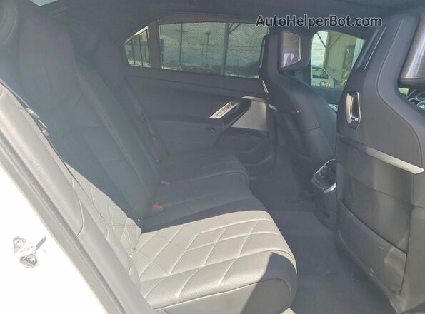WBY43EJ05RCS34374 2024 BMW OTHER White Vista de los asientos traseros