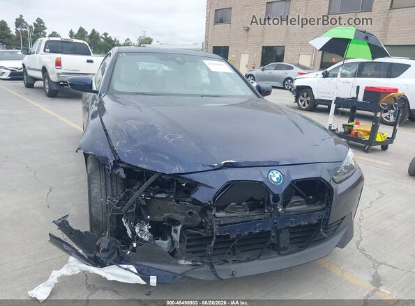 WBY73AW02RFS71024 2024 BMW I4 Blue Սալոնի հետևի տեսք