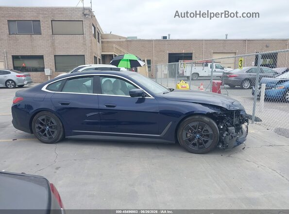 WBY73AW02RFS71024 2024 BMW I4 Blue Սալոնի 360 աստիճան տեսք