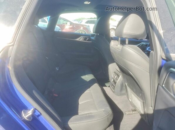 WBY73AW02RFS80726 2024 BMW I4 Blue Rear seats view