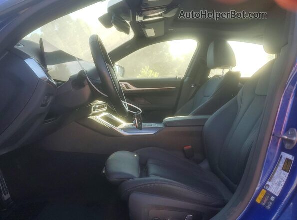WBY73AW02RFS80726 2024 BMW I4 Blue Front interior view