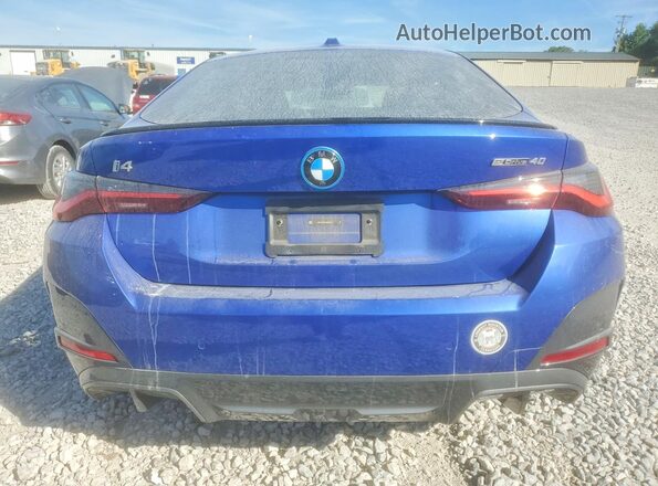 WBY73AW02RFS80726 2024 BMW I4 Blue Rear view