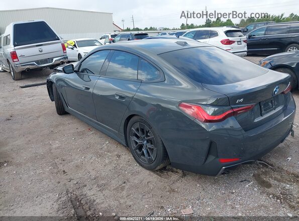 WBY73AW03PFN73287 2023 BMW I4 Gray Trasero izquierdo