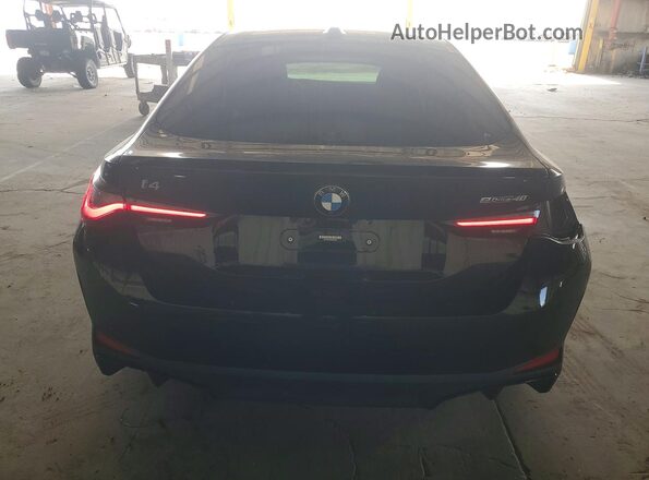 WBY73AW04NFN08557 2022 BMW I4 Black Հետևի տեսք