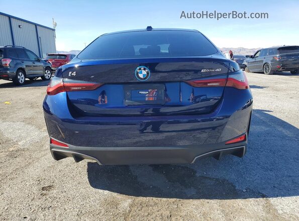 WBY73AW08NFN22199 2022 BMW I4 Blue Vista trasera