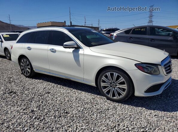 WDDZH6JB2KA607975 2019 MERCEDES-BENZ E White Front right