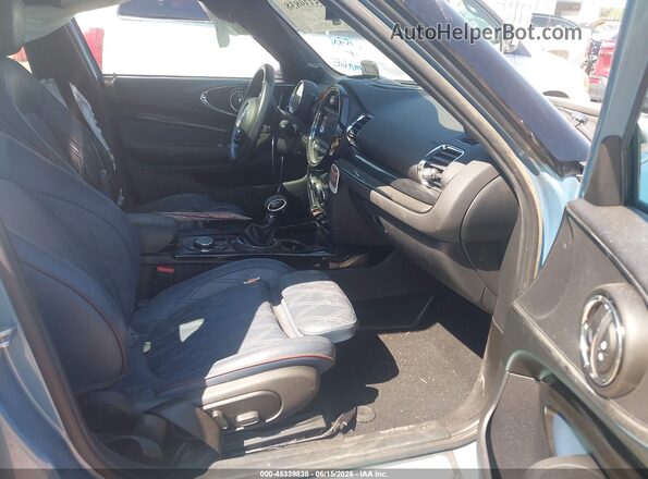 WMWLN9C38H2E50360 2017 MINI CLUBMAN Blue Front interior view