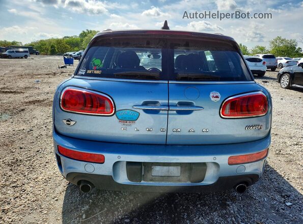 WMWLU5C51J2G03387 2018 MINI COOPER Blue Vista trasera