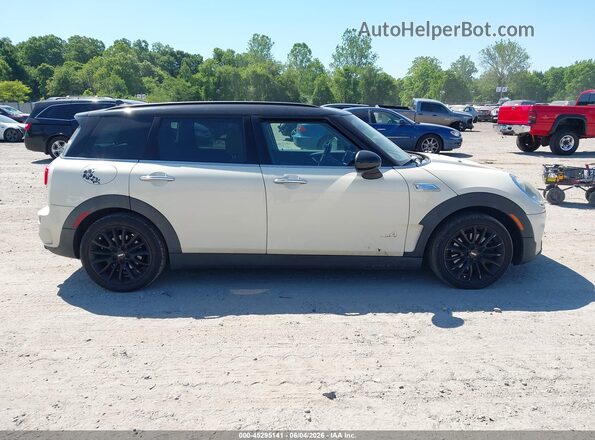 WMWLU5C5XH2E81624 2017 MINI CLUBMAN Cream Vista interior trasera