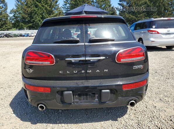 WMWLV7C02L2L93296 2020 MINI COOPER Black Հետևի տեսք