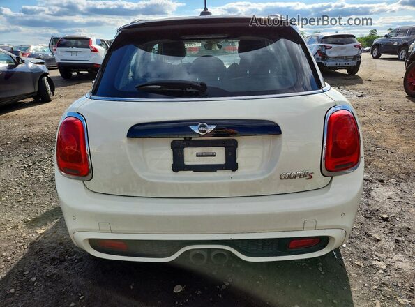 WMWXU3C33H2F49248 2017 MINI COOPER White Rear view