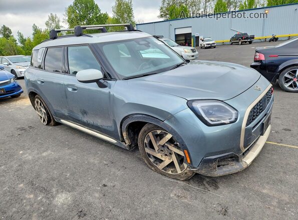 WMZ23GA09S7R90793 2025 MINI COUNTRYMAN Бирюзовый Передняя правая четверть
