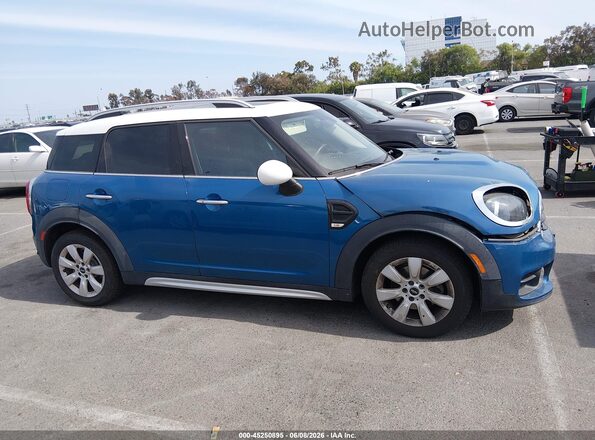 WMZYS7C35H3E07143 2017 MINI COUNTRYMAN Blue Vista interior trasera