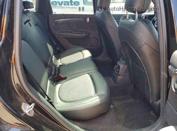 WMZYT5C32J3D83035 2018 MINI COOPER Black Rear seats view