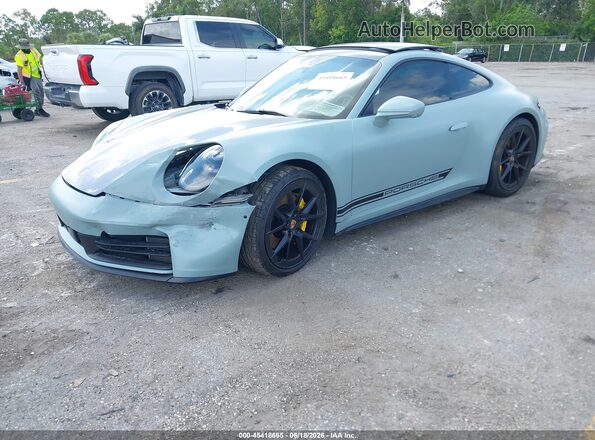 WP0AA2A92SS207197 2025 PORSCHE 911 Бирюзовый Передняя левая четверть