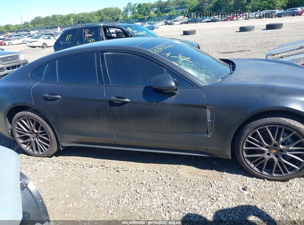 WP0AJ2A71PL103140 2023 PORSCHE PANAMERA Black Սալոնի հետևի տեսք