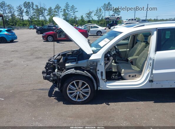 WVGAV7AX0GW585255 2016 VOLKSWAGEN TIGUAN White Front view