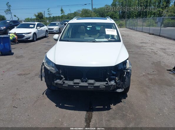 WVGAV7AX0GW585255 2016 VOLKSWAGEN TIGUAN White Rear interior view