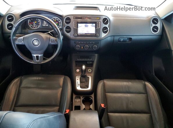 WVGAV7AX1GW580890 2016 VOLKSWAGEN TIGUAN Серебряный Вид панели приборов