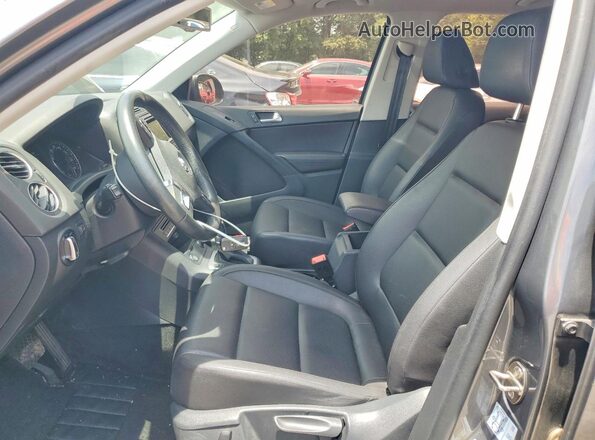 WVGAV7AX1GW582087 2016 VOLKSWAGEN TIGUAN Charcoal Front interior view