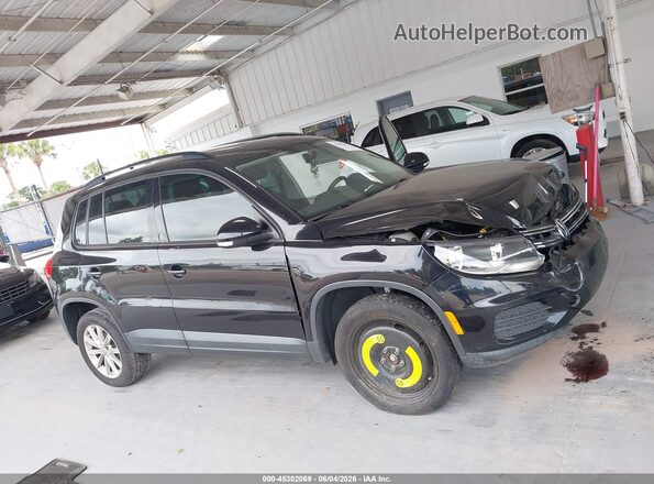 WVGAV7AX1HK043252 2017 VOLKSWAGEN TIGUAN Black Widok wnętrza z tyłu