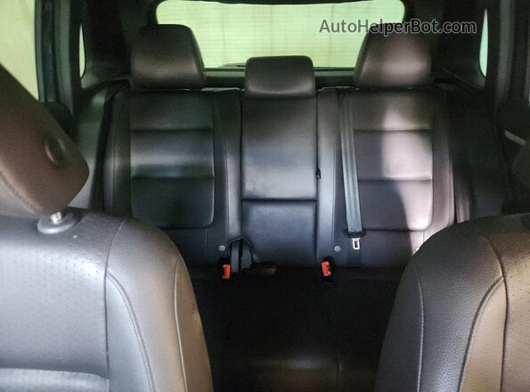 WVGAV7AX2GW067339 2016 VOLKSWAGEN TIGUAN Black Rear seats view